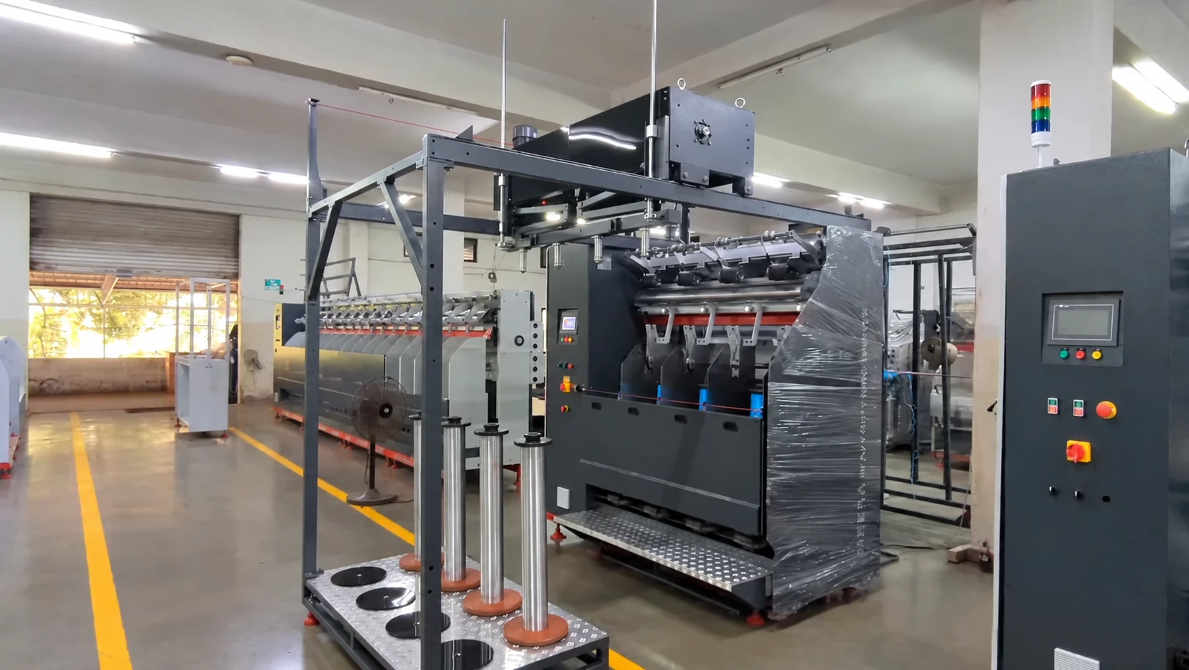 Complete RE-300 installation with doffing system